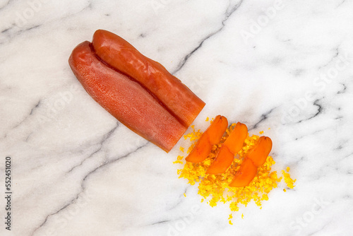 Close-up of a cut bottarga, dried mullet fish roe
 photo