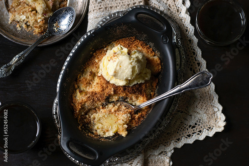 Sweet crunchy and crispy apple crumble served with ice-cream