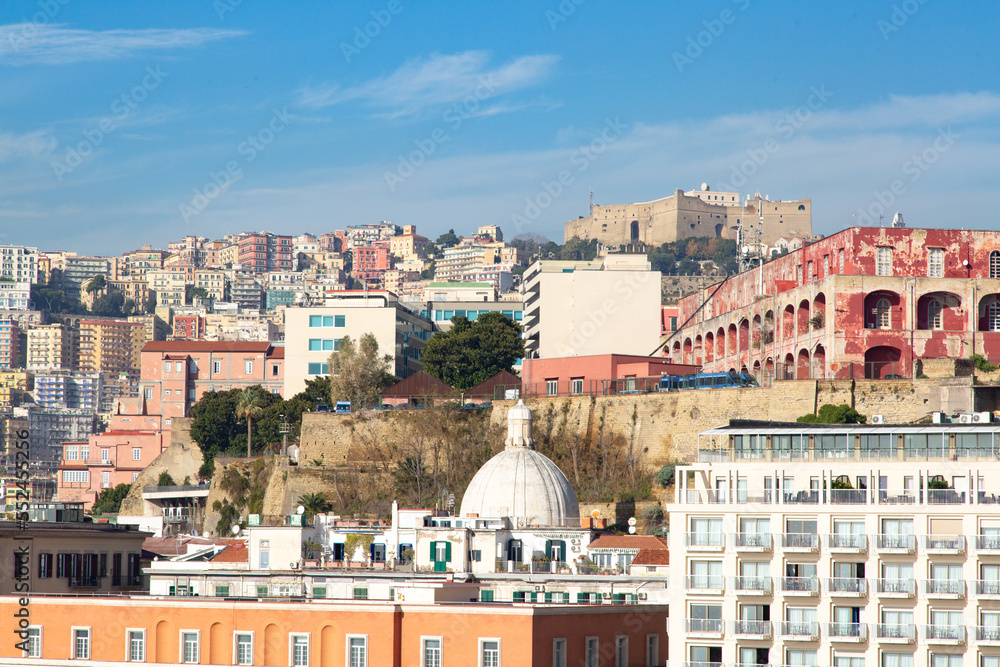 Panoramic view of Naples and the castle of Sant'Elmo on top of the city from the castle of Eggs on the embankment of the Gulf of Naples