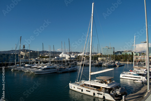 Boats and yachts moored in the harbor bay on a calm winter day © Albert
