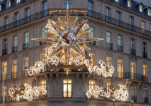 Paris, France - 12 08 2022: View of facade of Christian Dior Paris with christmas decoration photo