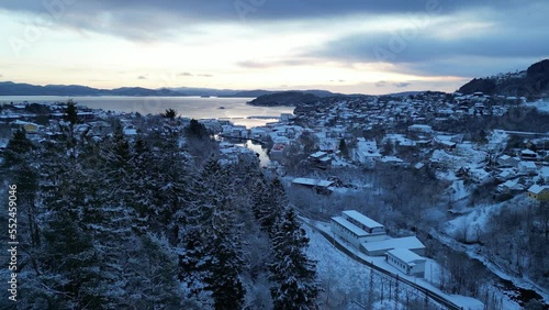 Wallpaper Mural Flight toward the harbor of the coastal town of Osøyro, Bjørnafjorden, Norway during winter. Sunset. Torontodigital.ca