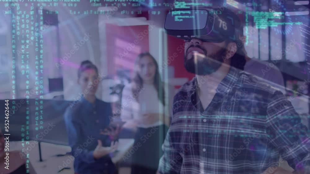 Animation of data processing over diverse female colleagues in office with man in vr headset Animation of data processing over diverse female colleagues in office with man in vr headset