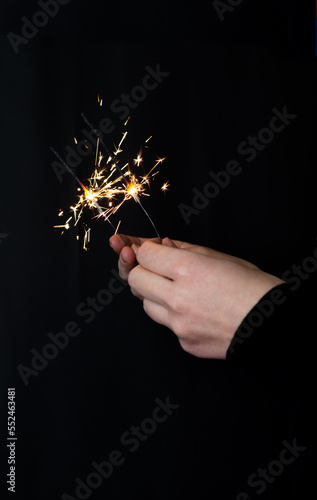 sparkler in hand