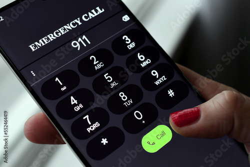 Dialing 911 Emergency services Call on mobile cell phone - police, fire department rescue EMT 