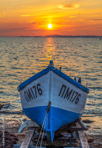Fishing boat and sunset