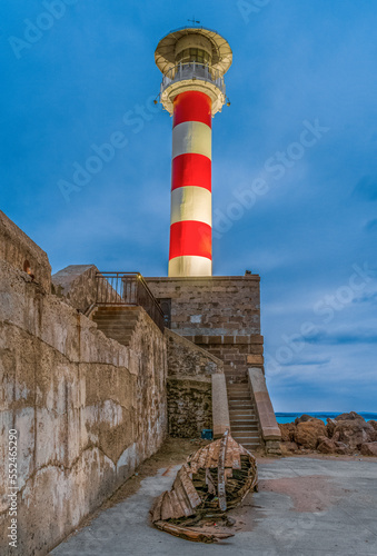 The old boat and lighthouse