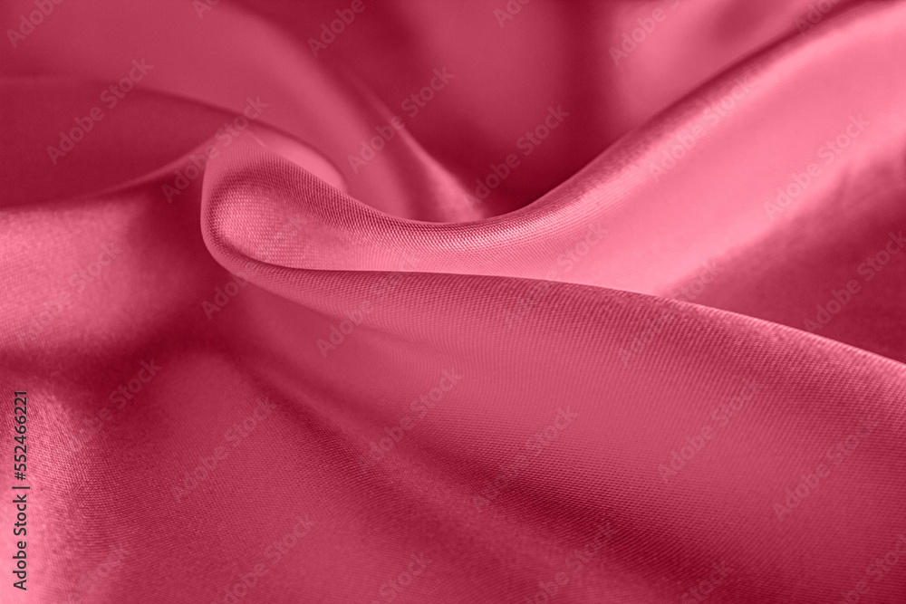 Fototapeta premium Viva Magenta silk background texture, abstract pattern for design. Sample of the color of the 2023 year.