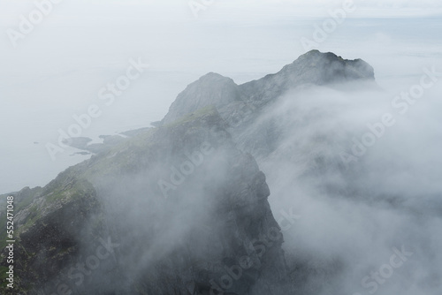 Misty mountains over Buvågen bay, Lofoten Islands, Norway