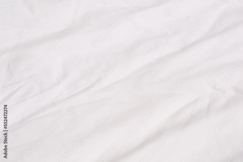 Texture of white cotton crumpled fabric Texture of white cotton crumpled fabric