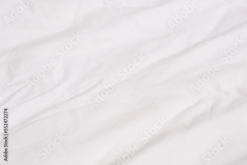 Texture of white cotton crumpled fabric