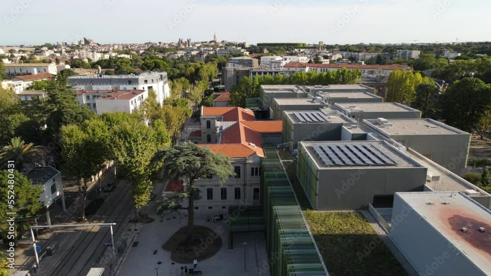 modern building with solar panels Montpellier aerial sunny day 