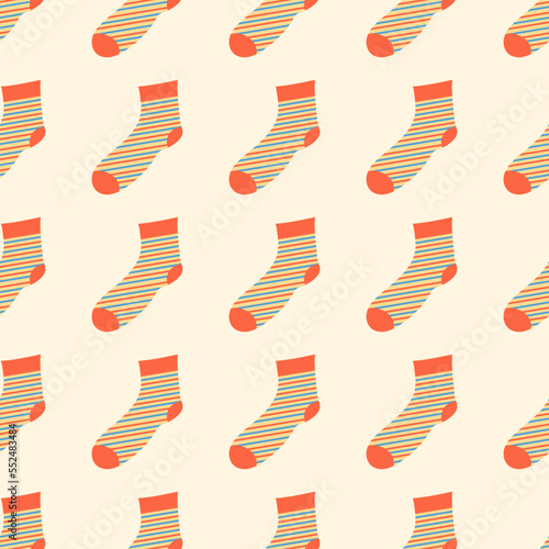Striped sock pattern on light orange background