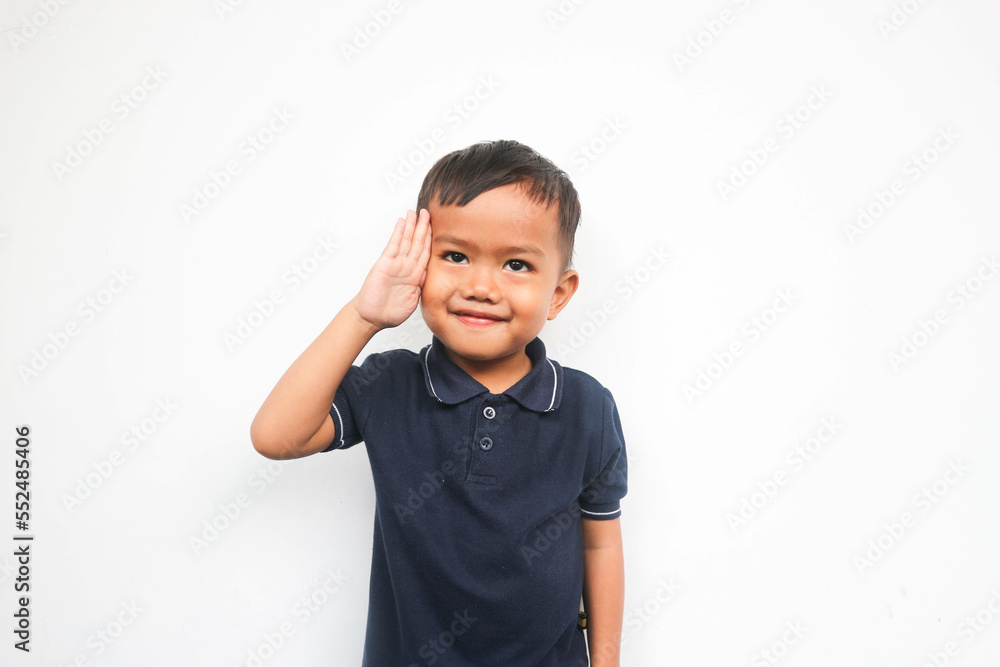 Toddler boy salute, toddler boy smiling looking at camera Toddler boy salute, toddler boy smiling looking at camera
