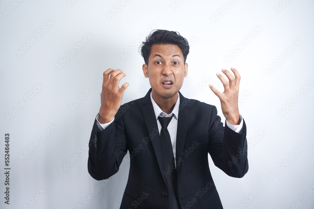 Angry man gesturing angrily raising hands and shouting loudly expressing anger after quarrel with boss or employee in suit isolated over white background. Feel my anger Angry man gesturing angrily raising hands and shouting loudly expressing anger after quarrel with boss or employee in suit isolated over white background. Feel my anger