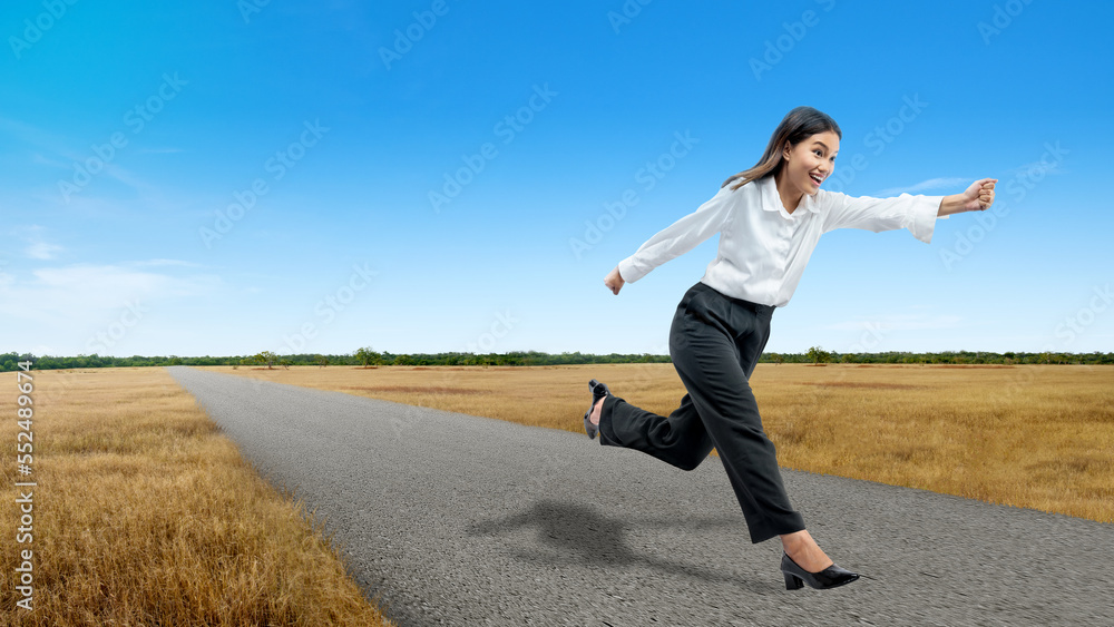 Asian businesswoman running
