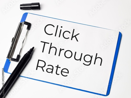 Click through rate concept written on paper clipboard.