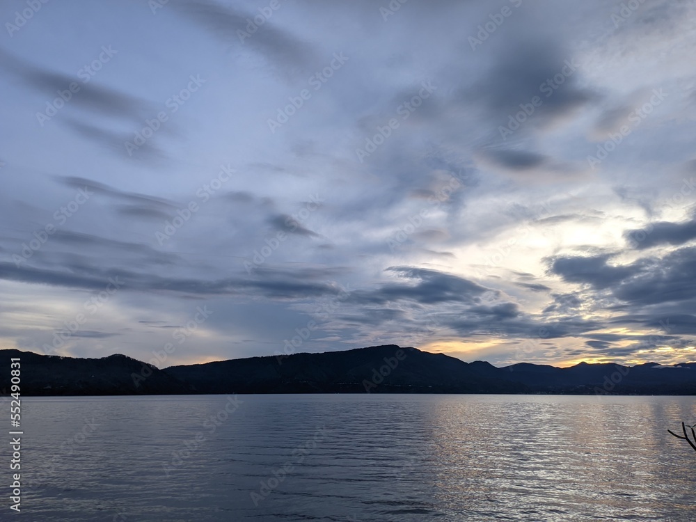 the beauty of the morning sky on lake toba