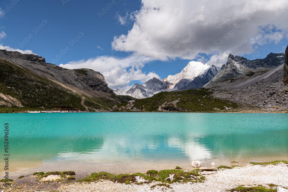 Sky reflection through the surface of the stunning Milk sea in Daocheng Yading, Sichuan, China. Because of its unique landform and original natural scenery, it is regarded as 