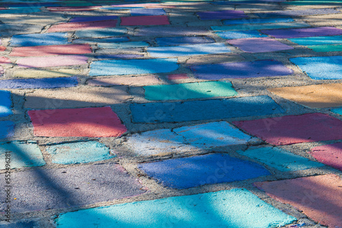 Abstract pattern of colorful concrete tiles and shadow and light