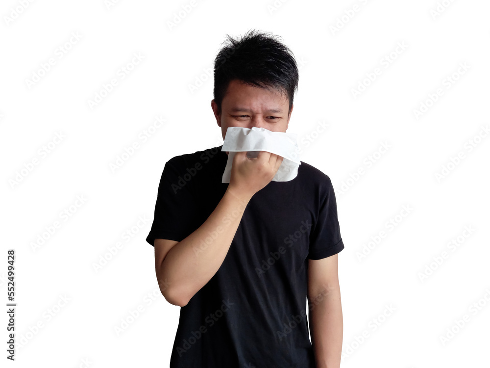 Young man in black shirt blowing his nose with white tissue paper Young man in black shirt blowing his nose with white tissue paper