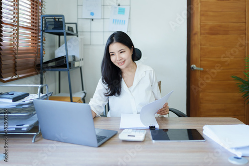 Canvas-taulu financial, Planning, Marketing and Accounting, portrait of Asian employee checki