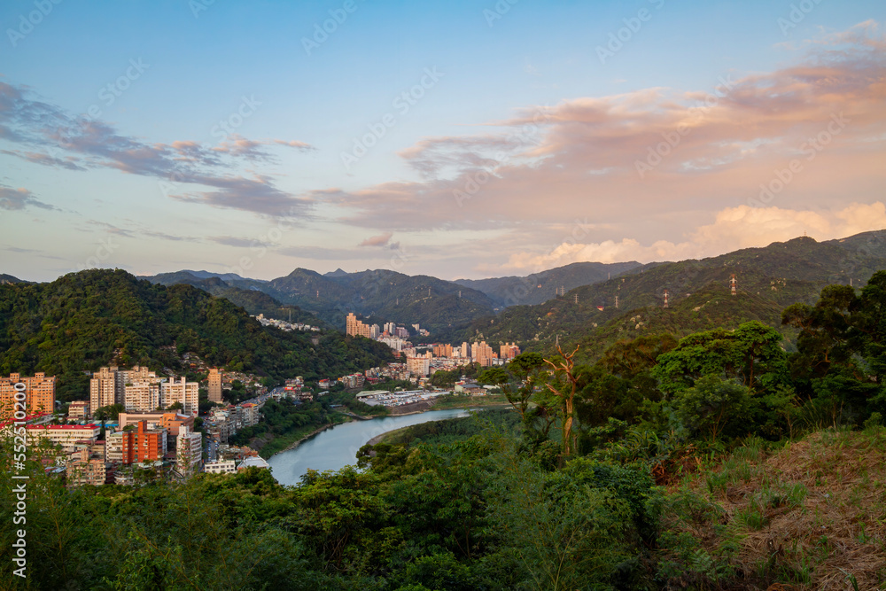 Sunset aerial view of the Xindan District cityscape from Hemei Mountain