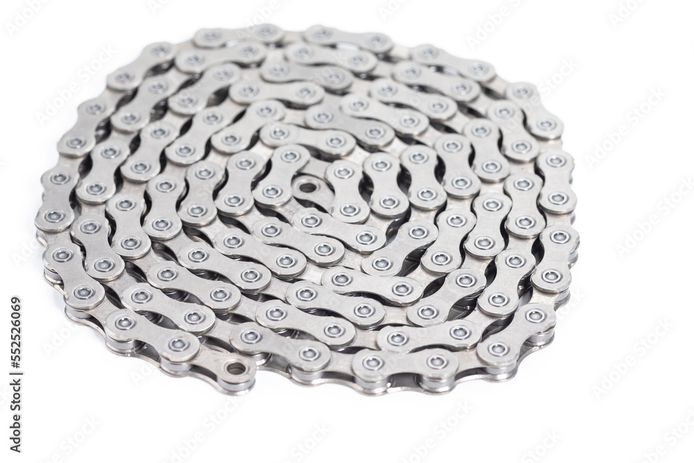 Image of New Clean Oiled Twisted Circled Bicycle Chain Isolated Over White Background. Image of New Clean Oiled Twisted Circled Bicycle Chain Isolated Over White Background.