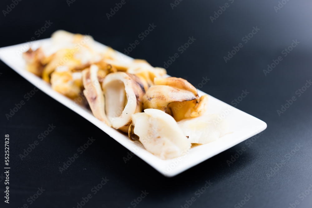 Grilled stuffed squid. Thai seafood sauce. Grilled stuffed squid. Thai seafood sauce.