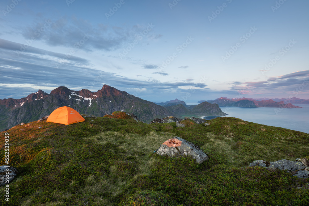 tent on summit of Skolmen mountain, Lofoten Islands, Norway tent on summit of Skolmen mountain, Lofoten Islands, Norway