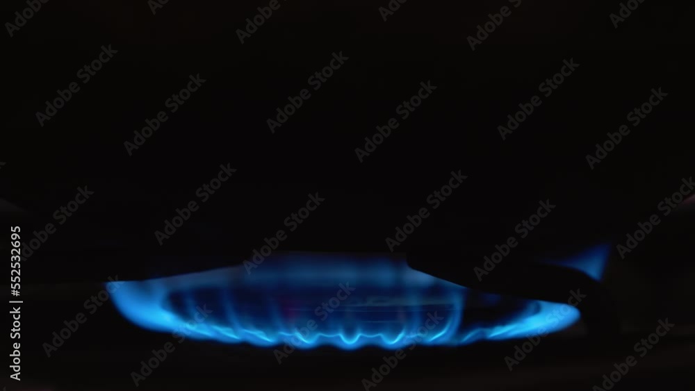 Blue flame. Gas stove. Shutdown of gas in Europe. Gas supply to residential premises Blue flame. Gas stove. Shutdown of gas in Europe. Gas supply to residential premises