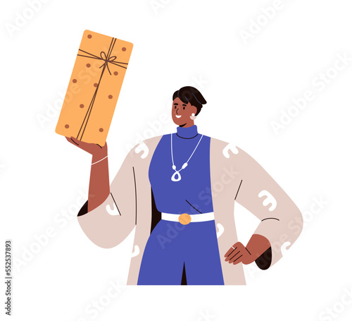 Happy black woman holding gift box in hand. African-American girl with presen...