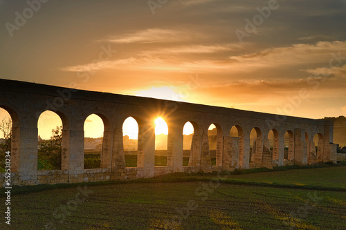 Canvas Print Sunset at the Gozo Aqueduct, an aqueduct on the island of Gozo, Malta