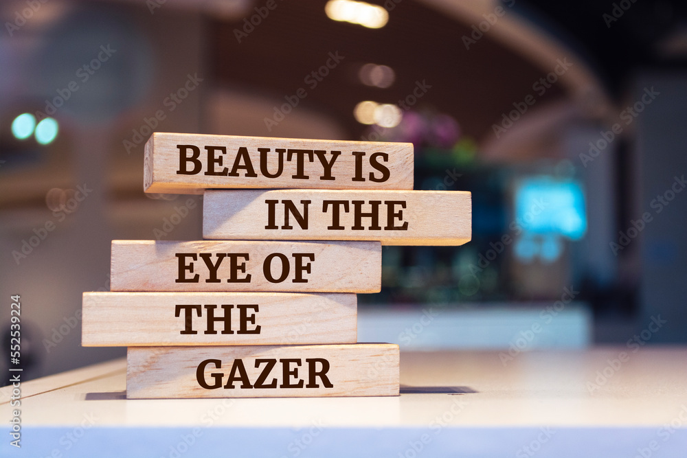 Wooden blocks with words 'Beauty is in the eye of the gazer'.