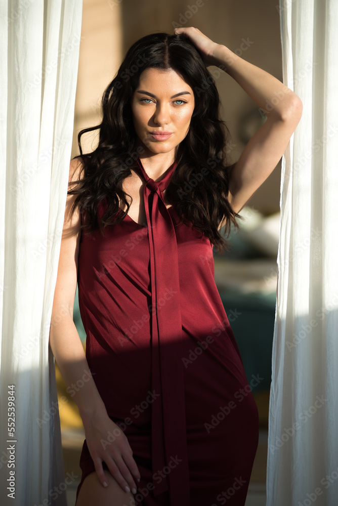 woman summer clothes in sunny interior woman summer clothes in sunny interior
