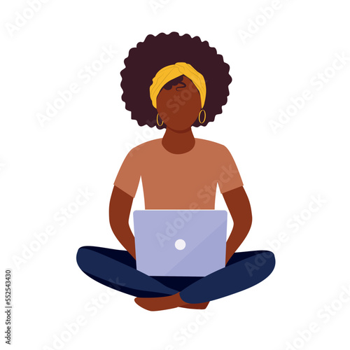 Young black woman using laptop computer sitting in lotus pose with crossed legs isolated on white