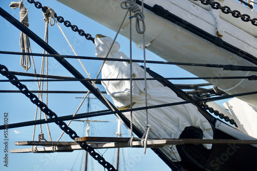 figurehead of a historic tall ship museum docked in the harbor