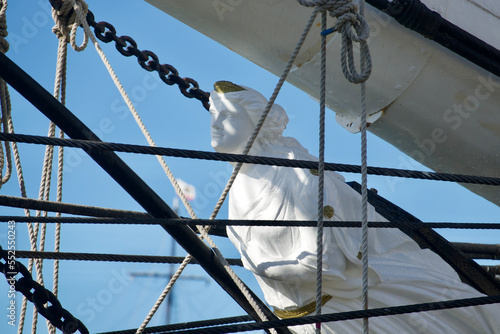 figurehead of a historic tall ship museum docked in the harbor