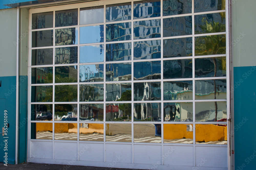 Obraz premium reflection in glass panes of roll-up garage door