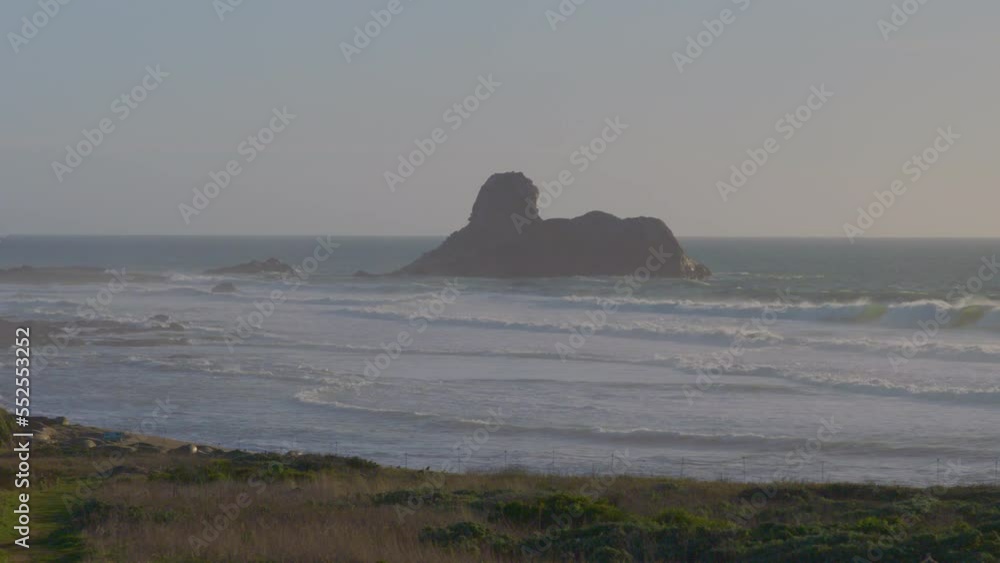 Time lapse of a huge bolder near the shore on the Pacific coast with fast moving waves crashing around it.
located in Big Sur California. Time lapse of a huge bolder near the shore on the Pacific coast with fast moving waves crashing around it.
located in Big Sur California.