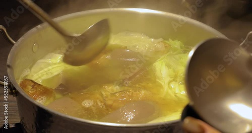 Close-up hot table-style sand tea hot pot photo