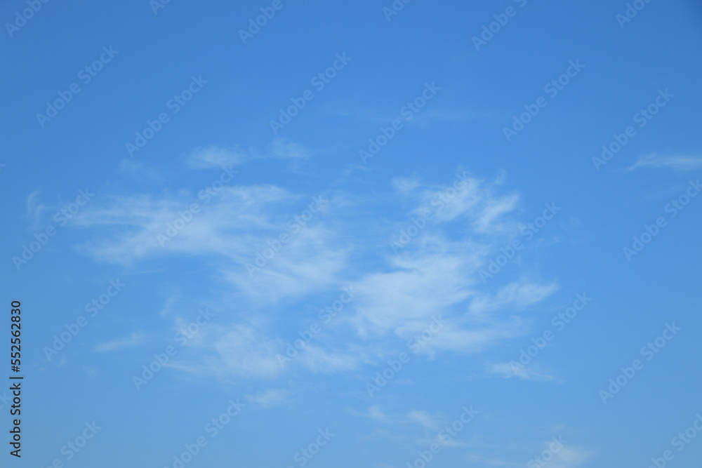 blue sky background with tiny clouds - obrazy, fototapety, plakaty 