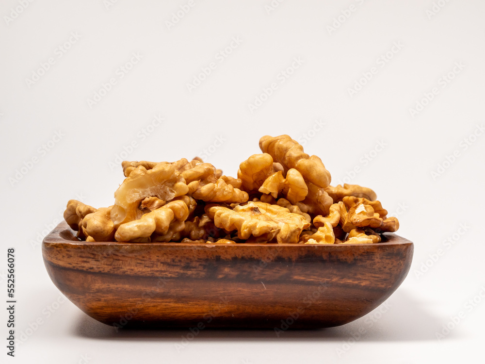 Walnut on a white background. Raw walnut. Walnut on a white background. Raw walnut.
