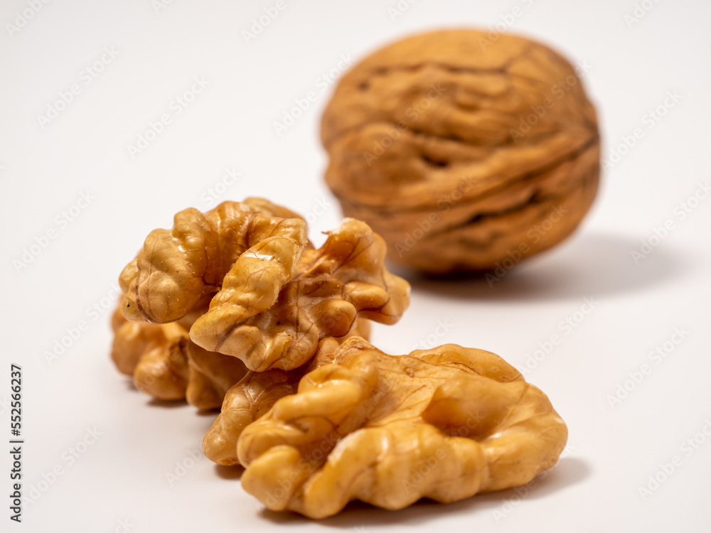 Walnut on a white background. Raw walnut. Walnut on a white background. Raw walnut.