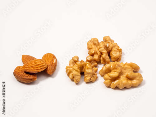 Almond and walnut on a white background. Raw nuts.