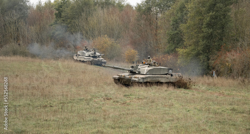  two British army FV4034 Challenger 2 ii main battle tanks in action on a military combat exercise, Wiltshire UK