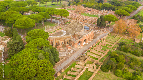 Aerial view on the Excavations road and the Roman theatre of Ostia Antica, a large archaeological site. These Roman ruins are located in the archaeological area of Ostia Antica, near Rome, Italy.
 photo