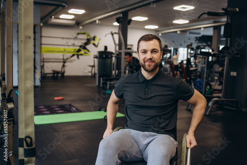 Person who uses a wheelchair training in the gym. Rehabilitation center