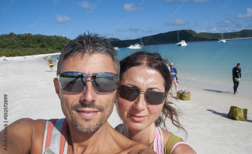 Selfie of a happy caucasian couple on vacation relaxing on a beautiful tropical beach Selfie of a happy caucasian couple on vacation relaxing on a beautiful tropical beach