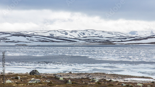 Frozen lake in the Hardangervidda mountain area in Norway